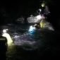 Tangkapan layar video yang beredar di media sosial memperlihatkan sekelompok remaja mengaku terjebak banjir di kawasan wisata Air Terjun Paliak, Sabtu (22/11).